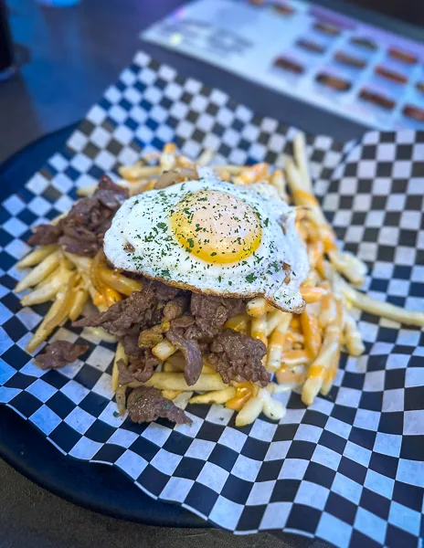 fries with bulgogi  and a fried egg from k-chicken & beer in monrovia