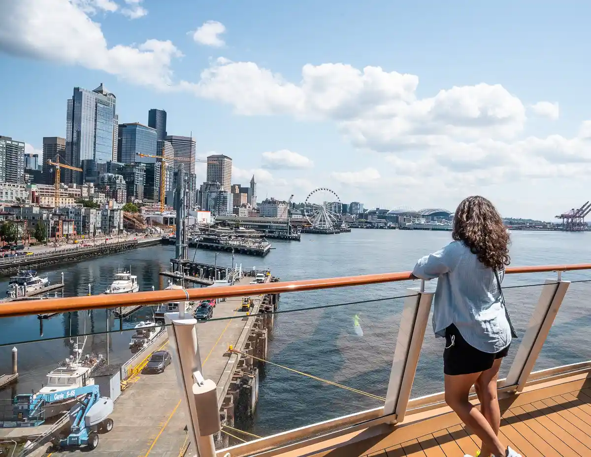 kathy enjoying the seattle skyline after embarking on the ship