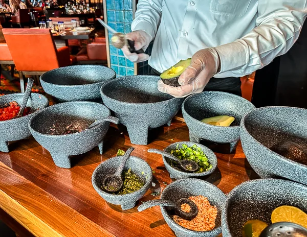 tableside guacamole at los lobos on the ncl encore