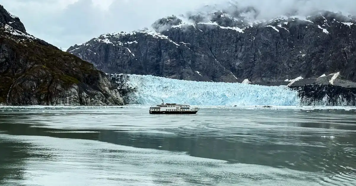 featured image: Cruise ship sailing near Margerie Glacier while cruising Glacier Bay National Park in Alaska.