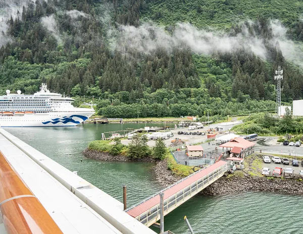 view of aj dock and a princess cruise ship at juneau cruise port from our ncl portside balcony