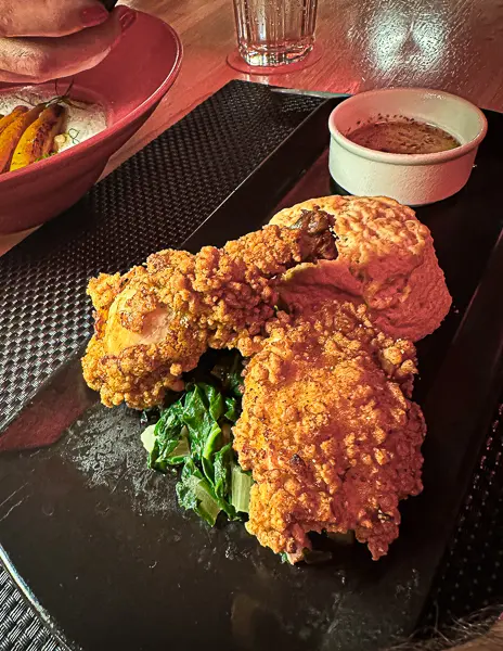 fried chicken and biscuits from razzle dazzle at scarlet lady