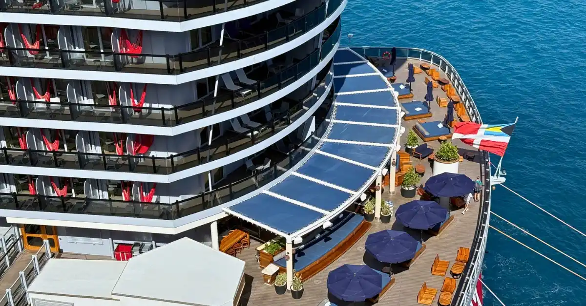 featured image: Balcony hammocks and outdoor lounge areas on a Virgin Voyages cruise ship, a setting that inspires helpful Virgin Voyages tips for future Sailors.