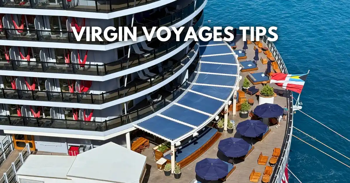 featured blog image: Overlay text reads “Virgin Voyages Tips” on a Virgin Voyages cruise ship deck with balconies, red hammocks, shaded lounge area, and the Virgin flag at the stern.