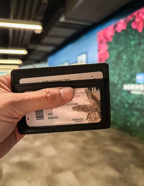 Gold cruise card for The Haven on Norwegian Encore, shown in the new slim Haven-branded wallet during embarkation in Seattle