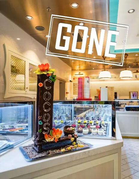 Display case inside Coco’s on Norwegian Encore, a dessert venue removed during the 2024 dry dock, with a “GONE” label added to the image.