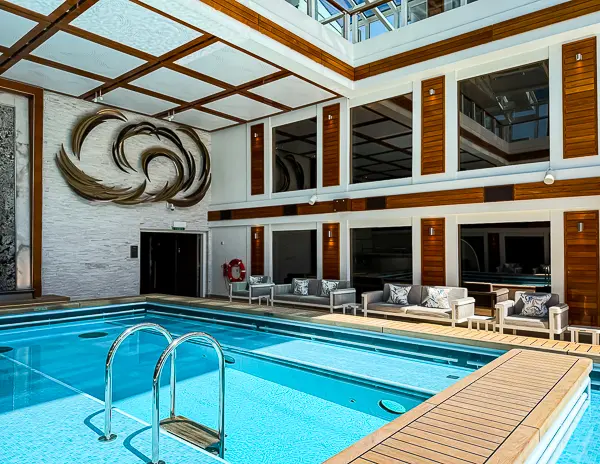 The Haven Courtyard pool area on Norwegian Encore, just steps away from Penthouse Suite 17112.