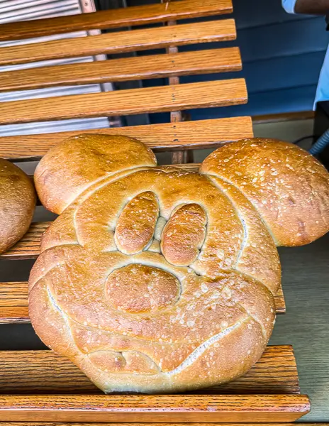 Freshly baked Mickey-shaped sourdough loaf on display at Disney California Adventure.