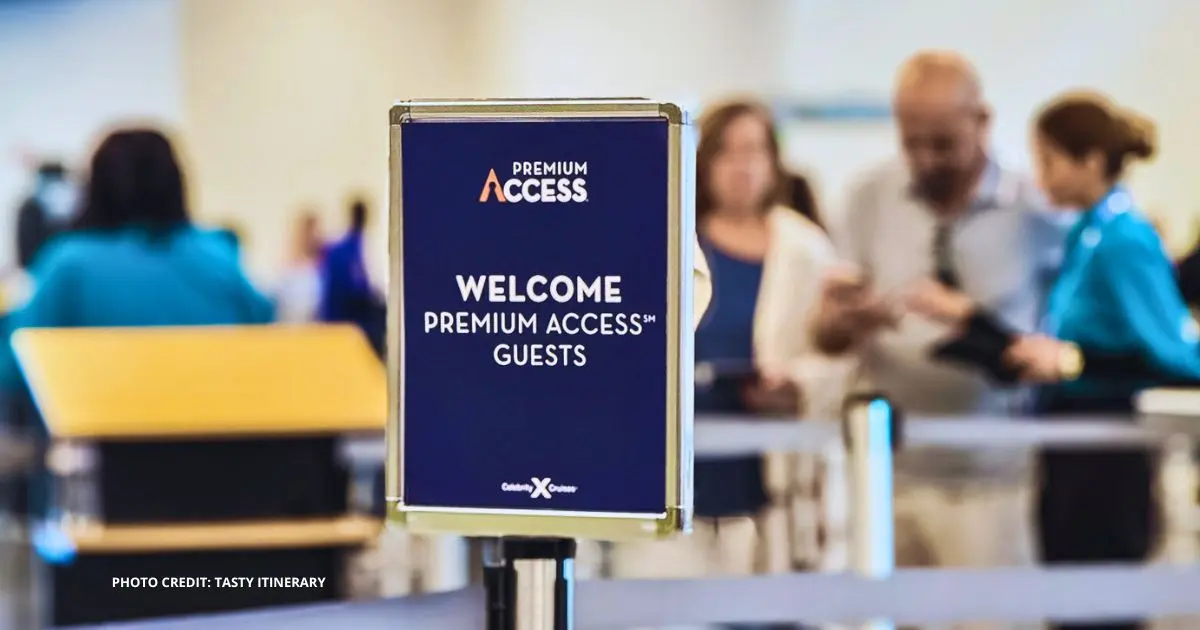 Celebrity Cruises Premium Access sign at the embarkation terminal, welcoming Premium Access guests to a priority check-in line.
