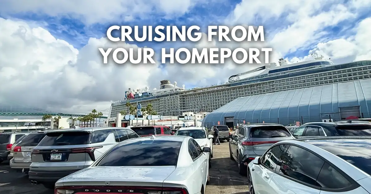 featured blog image: Featured image showing a cruise ship docked at a U.S. homeport with cars parked in the foreground, highlighting the idea of driving to the cruise port and cruising from your homeport. The text on the image reads: “Cruising From Your Homeport.”