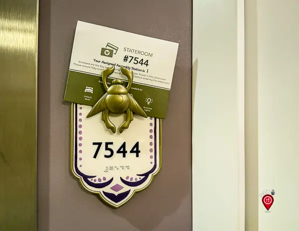 Key to the World card hanging outside Disney cruise stateroom 7544 door on embarkation day.