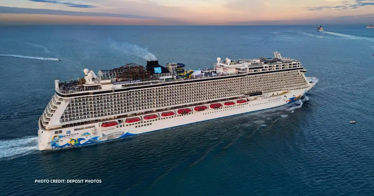 Norwegian Escape cruise ship sailing at sea, used for a news story about NCL’s new first responder discount.