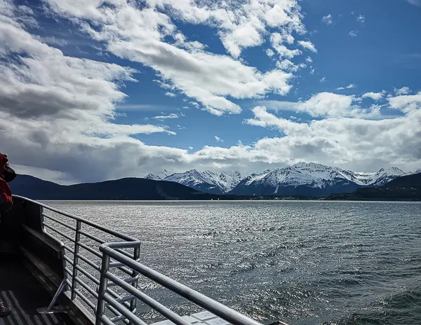 Snowcapped mountains and water views from the top deck of the excursion boat leaving Skagway.