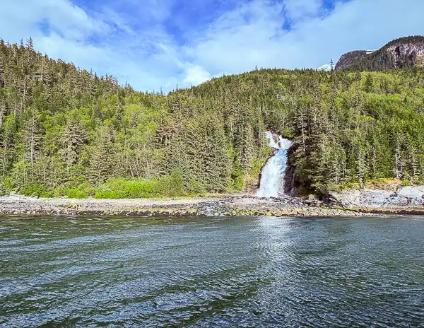 Waterfall along the shoreline during the boat ride back to Skagway after visiting Glacier Point.