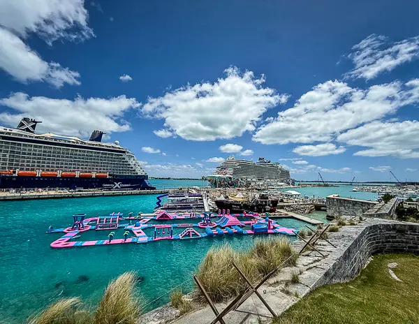 King’s Wharf and Heritage Wharf at Royal Naval Dockyard in Bermuda with two cruise ships docked at the Bermuda cruise port.