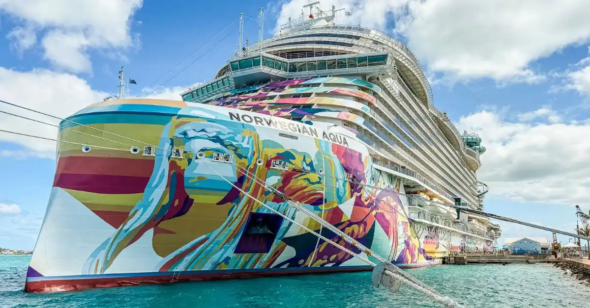 NCL Aqua cruise ship docked in Bermuda, featured image for a Norwegian Aqua review of our 7 nights in The Haven.