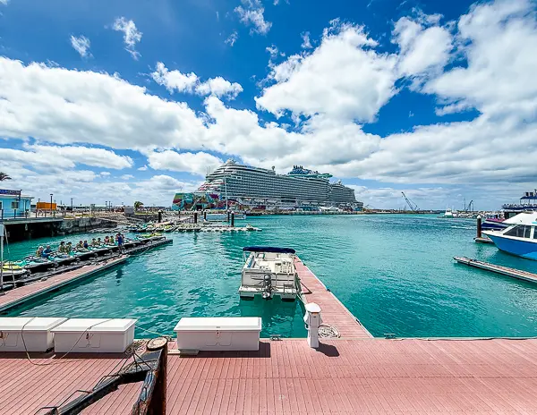 Cruise ships docked at Royal Naval Dockyard in Bermuda, viewed from the marina at the Bermuda cruise port.