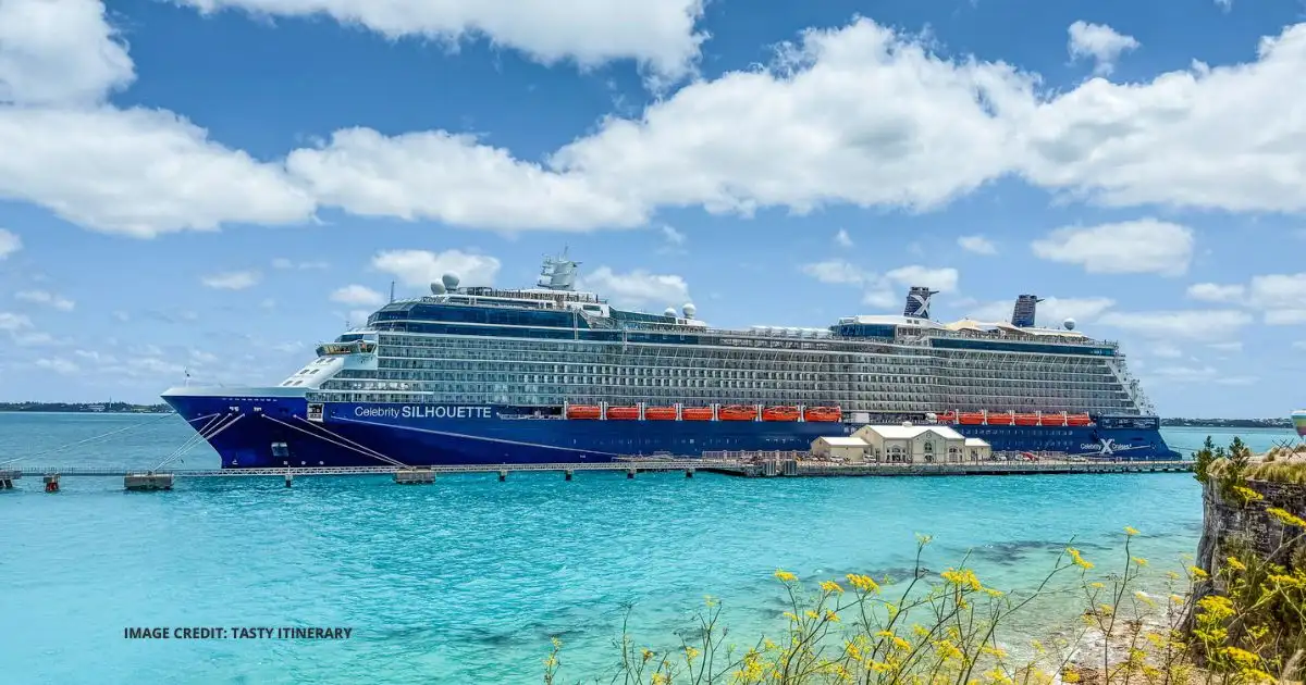 Celebrity Silhouette cruise ship docked in Bermuda beside turquoise water under a bright blue sky.
