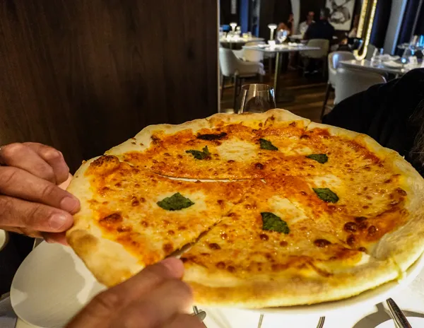 Margherita pizza served at Onda by Scarpetta specialty restaurant on Norwegian Aqua.