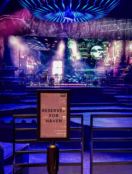 Norwegian Aqua theater with Reserved for The Haven sign marking priority seating for Haven guests.
