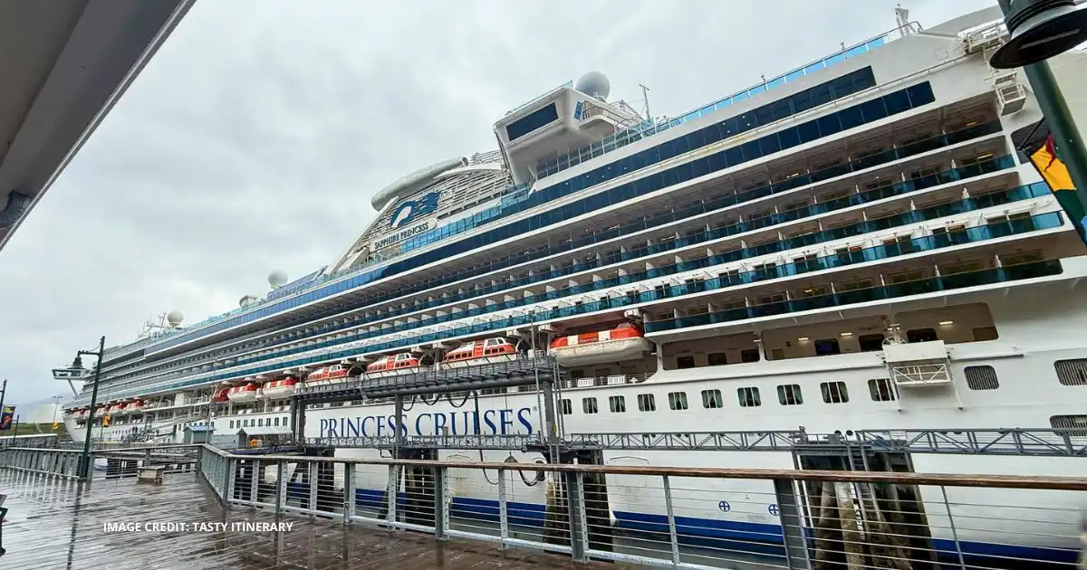 Sapphire Princess docked at a cruise terminal with the Princess Cruises name visible along the side of the ship.